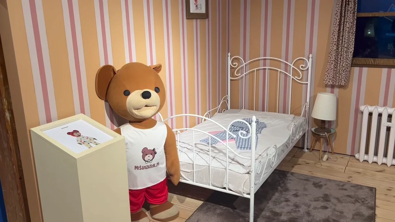 Miś Uszatek exhibit with character figure and bed display