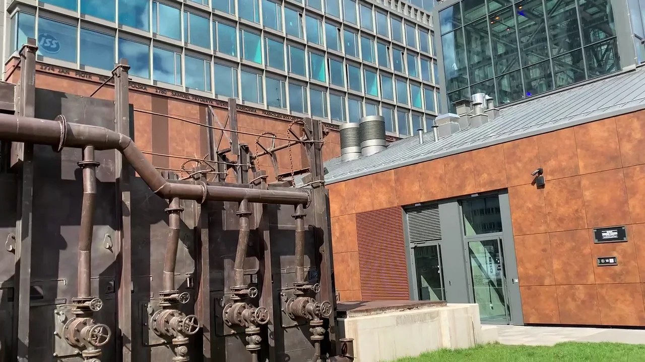 Preserved industrial machinery and brick architecture in Warsaw