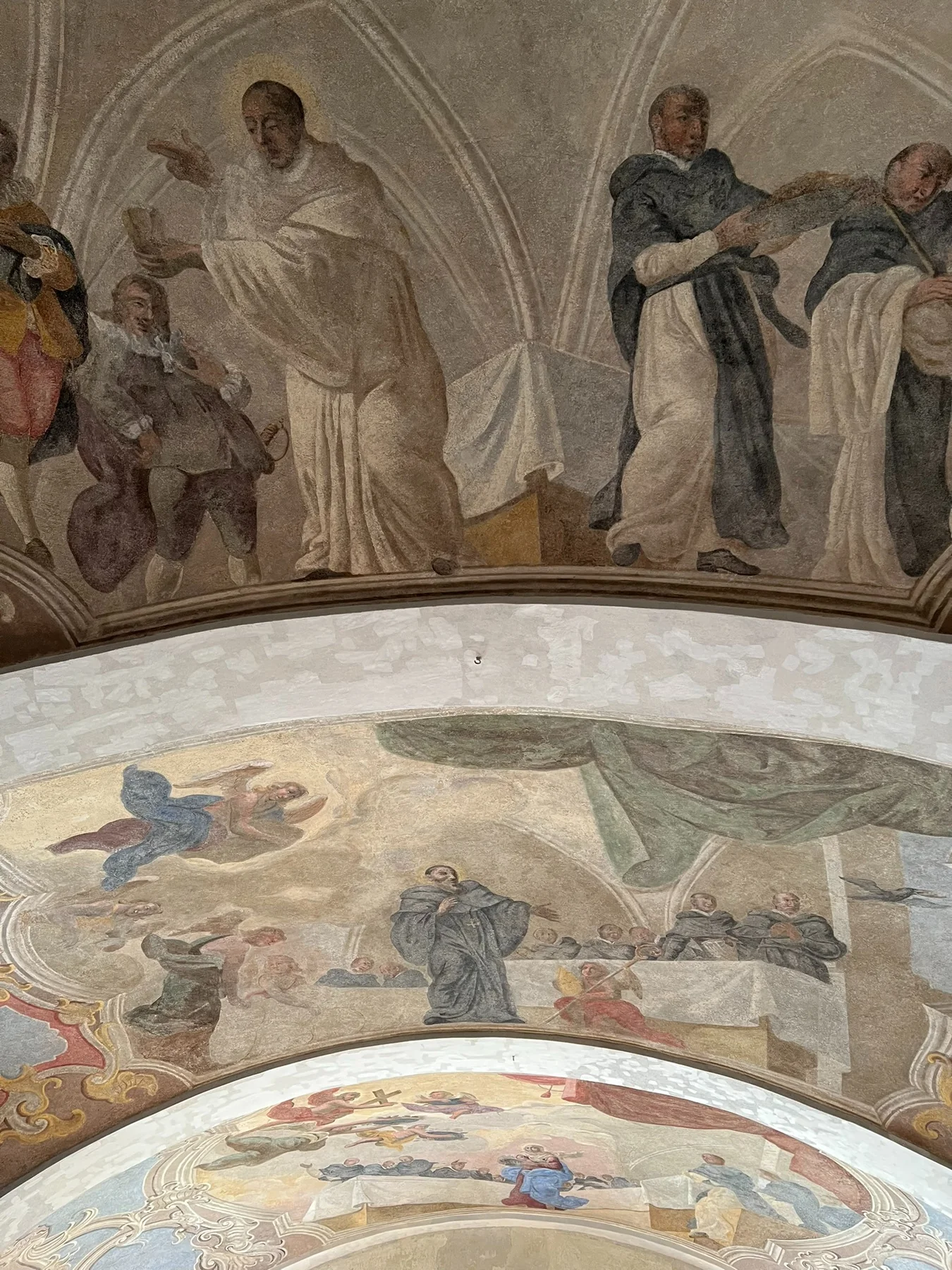 Historic figural wall painting preserved within a former Cistercian monastic complex.
