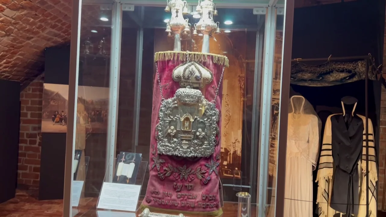 A richly decorated Jewish ceremonial textile displayed in a museum in Konin.