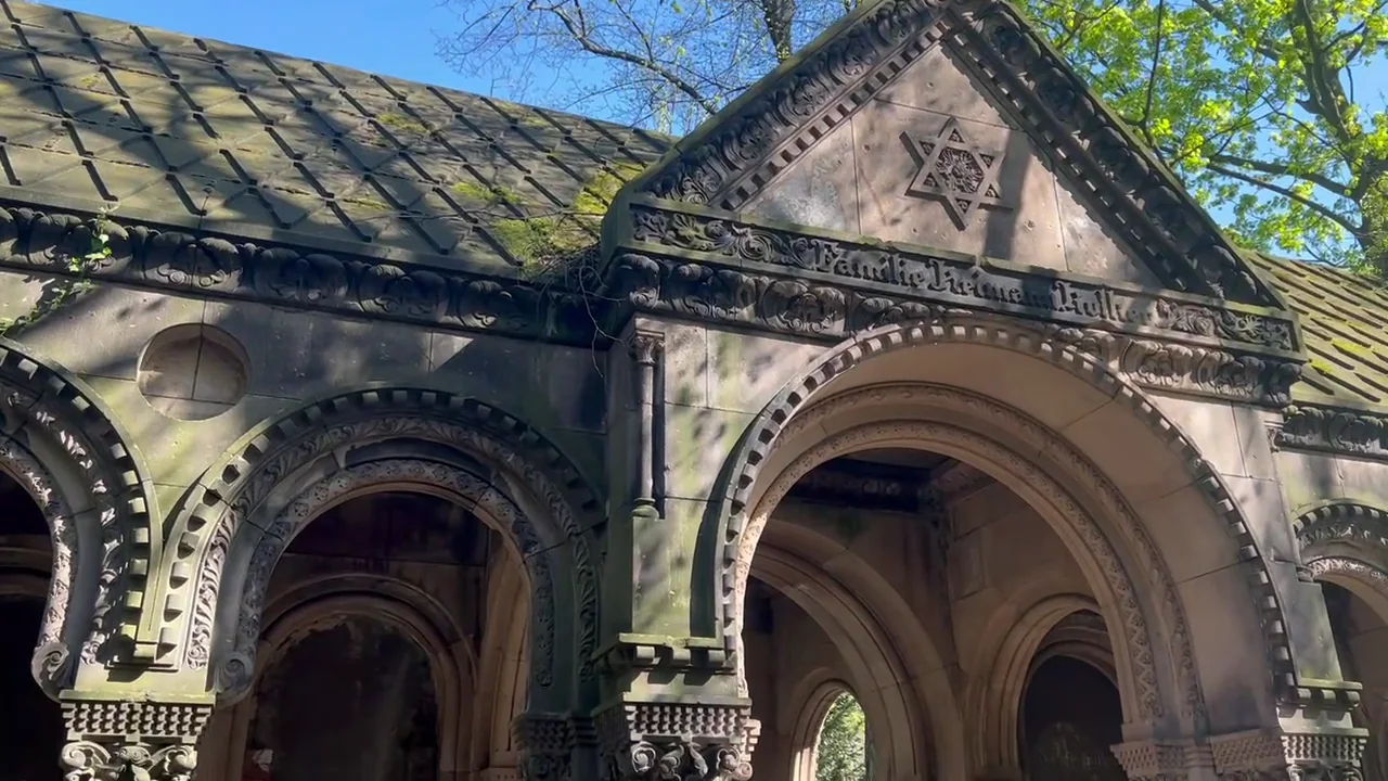 Historic Jewish funerary monument in Wrocław with a Star of David.
