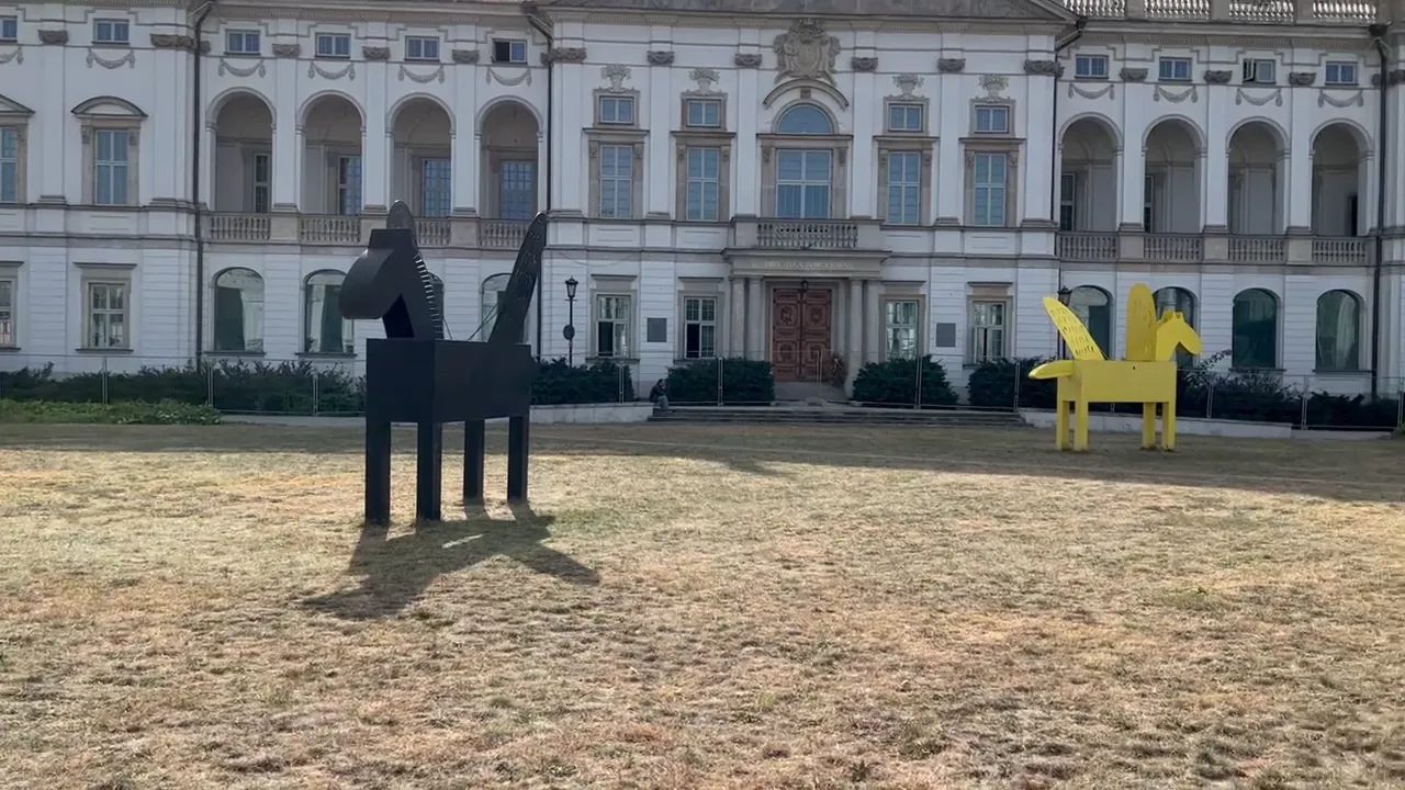 Krasiński Palace with modern Pegasus sculptures on the lawn