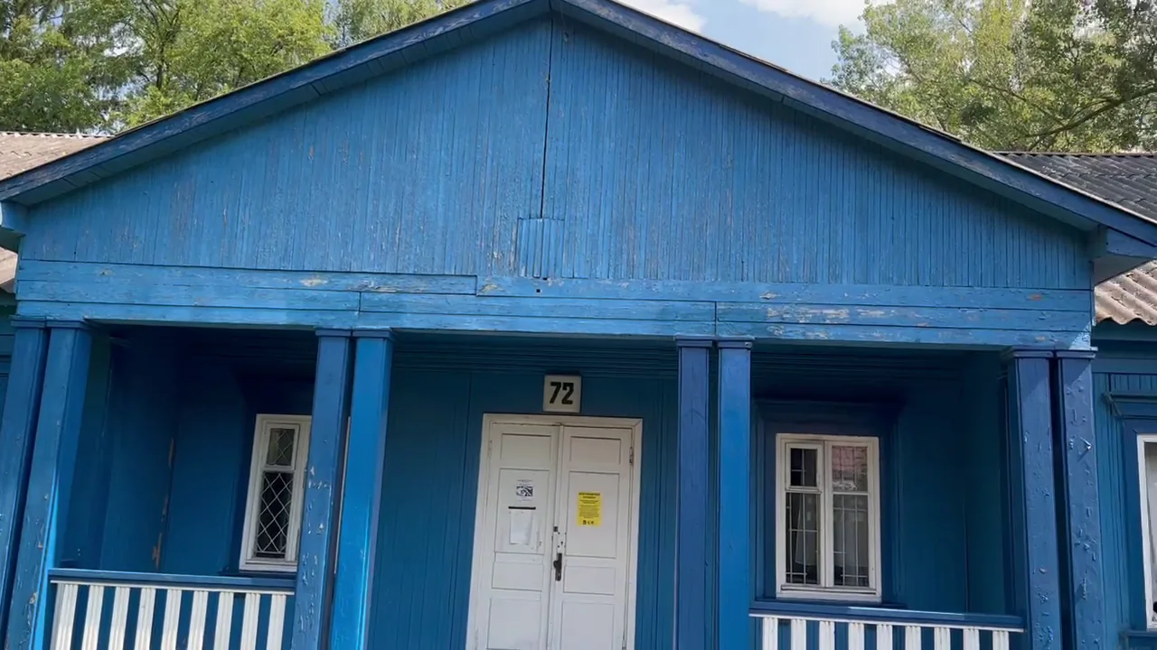Your blue wooden house photograph from Osiedle Przyjaźń