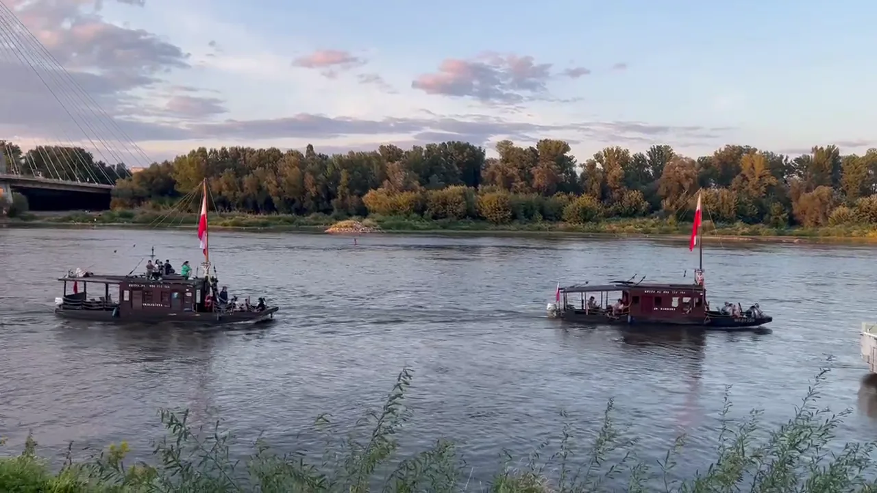 Traditional-style Polish riverboats carrying passengers along the Vistula