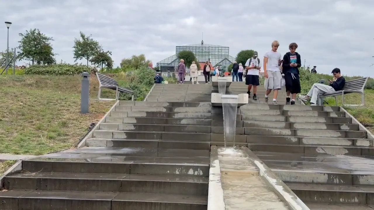 Steps and water cascading towards the Zielona Góra Palm House